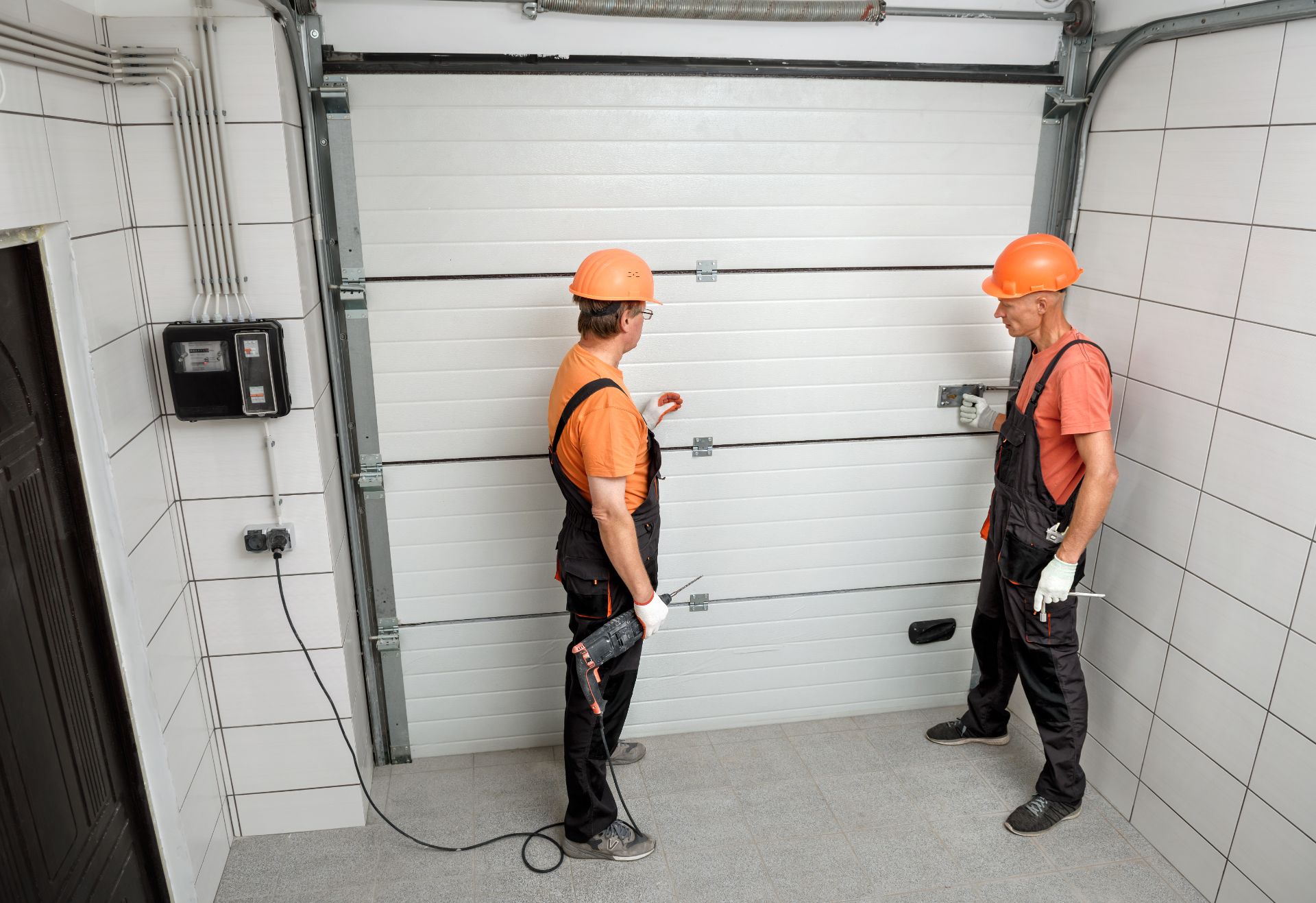 workers-are-installing-lift-gates-garage (1)